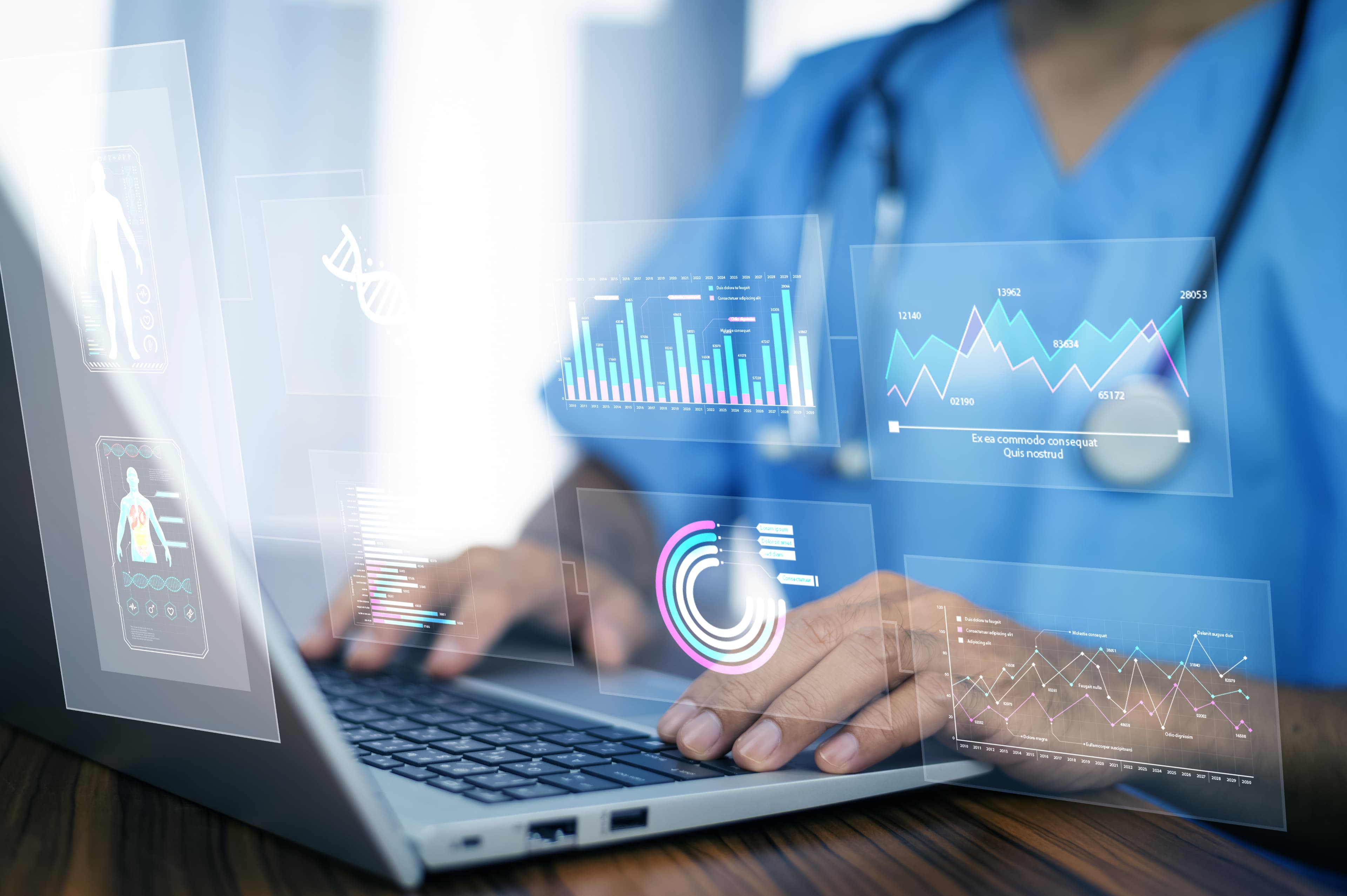 Doctor monitoring data on laptop dashboard